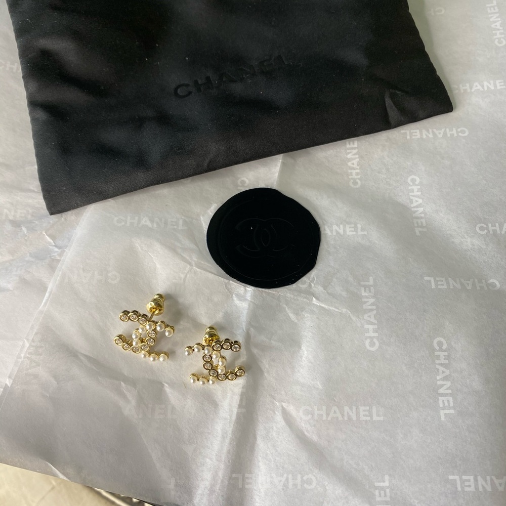Authentic CHANEL stud CC earrings